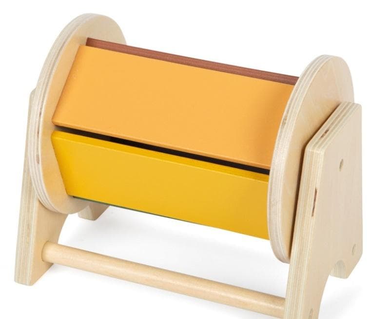Obrotowy sensoryczmy bębenek Montessori